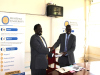 Assoc. Professor Kucel hands over office